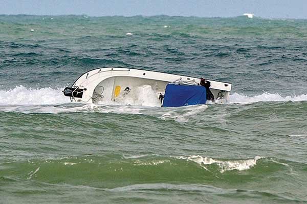 large wave capsize boat